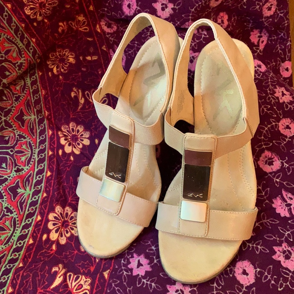 Lightly worn sandals. 3 inch heel.